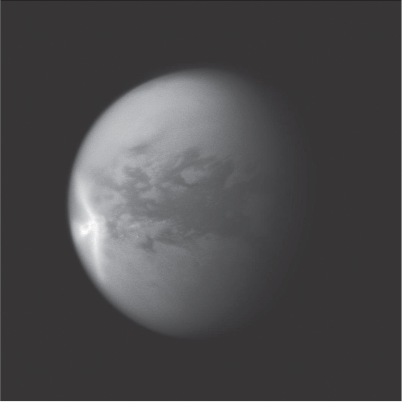 Cassini has greatly expanded our understanding of cloud on Titan, revealing unexpected morphologies such as the giant "arrow-shaped" cloud (near left in photo) of 2011. Rainfall darkened the surface which covered over 500,000 km2. After the methane evaporated, it was followed by localised surface brightening.                                          Image credit: NASA/JPL/STScI. Image PIA12817